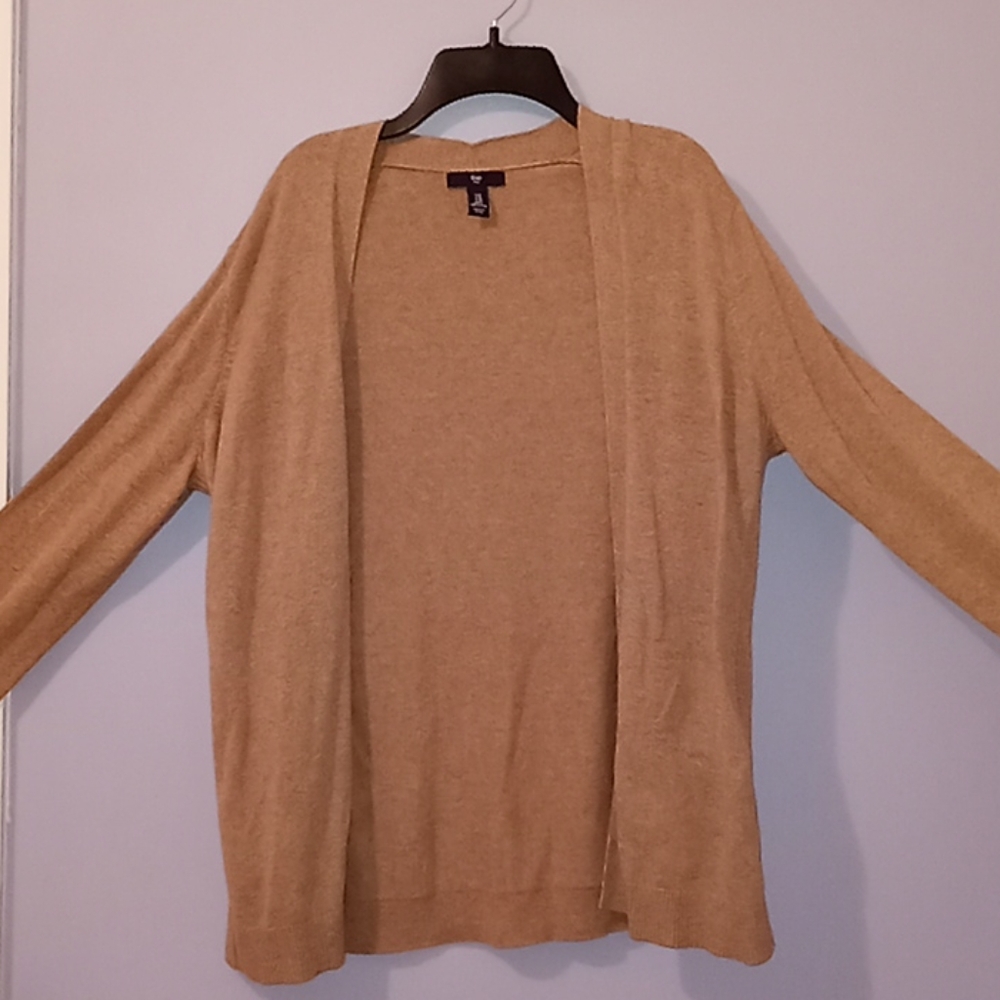 Brown cardigan.